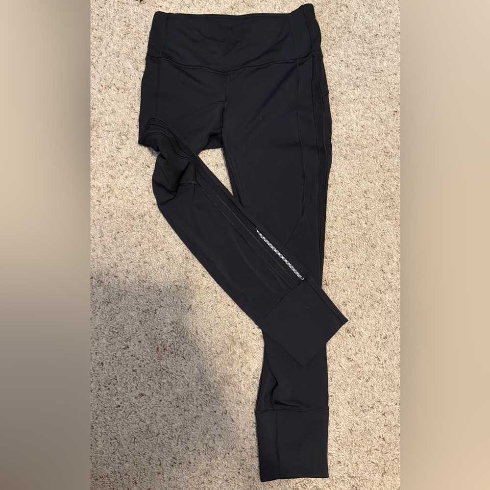 Lululemon Black running tights with mesh inlay